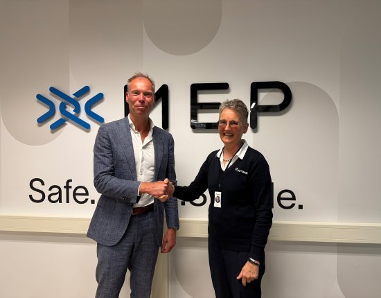 Werner Van Eck and Merete Berdal shaking hands. Werner Van Eck and Merete Berdal shaking hands.