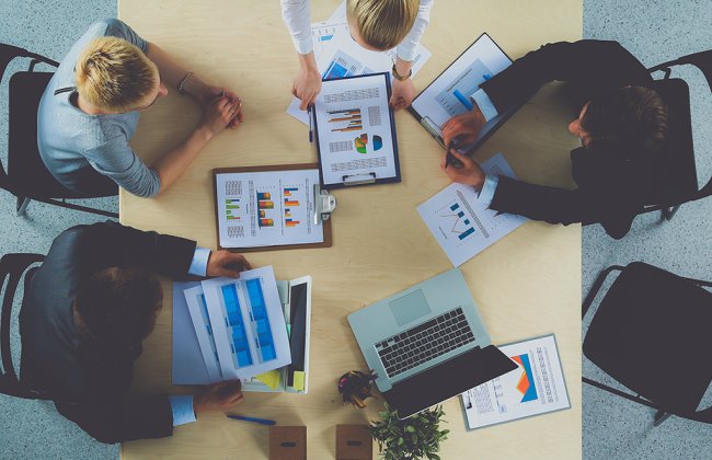 Business meeting with 4 people. Business meeting with 4 people.