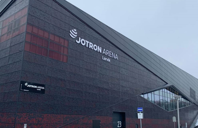 Jotron Arena in Larvik, showing the Jotron logo on the wall. Jotron Arena in Larvik, showing the Jotron logo on the wall.