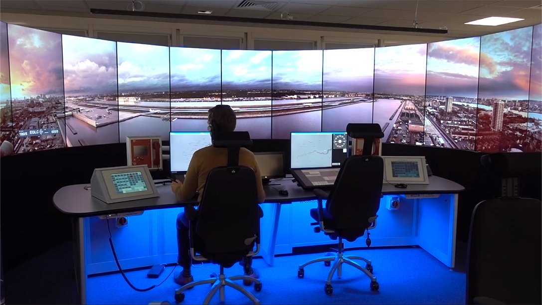 Two controller inside ATC tower.
