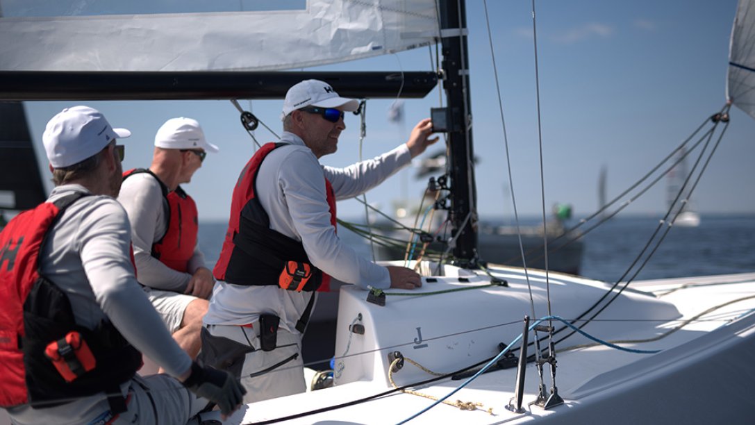 Sailors porting Tron SA20 PLBs.