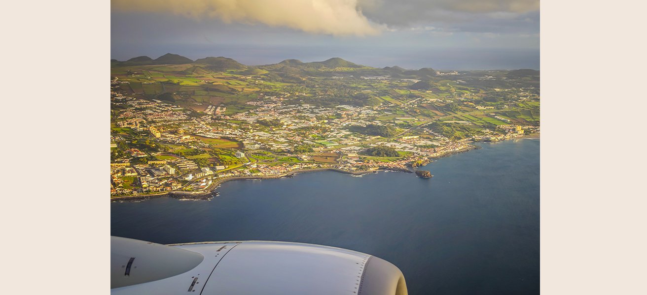 Aerial view from a plane window of the Azores islands in the middle of Atlantic ocean.