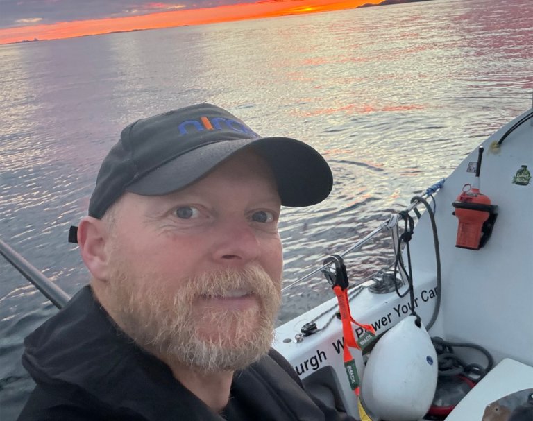 The skipper of Nordic Endeavour with a Tron 60AIS EPIRB.