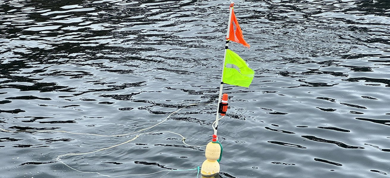 Fishing buoy TronTracker at sea.
