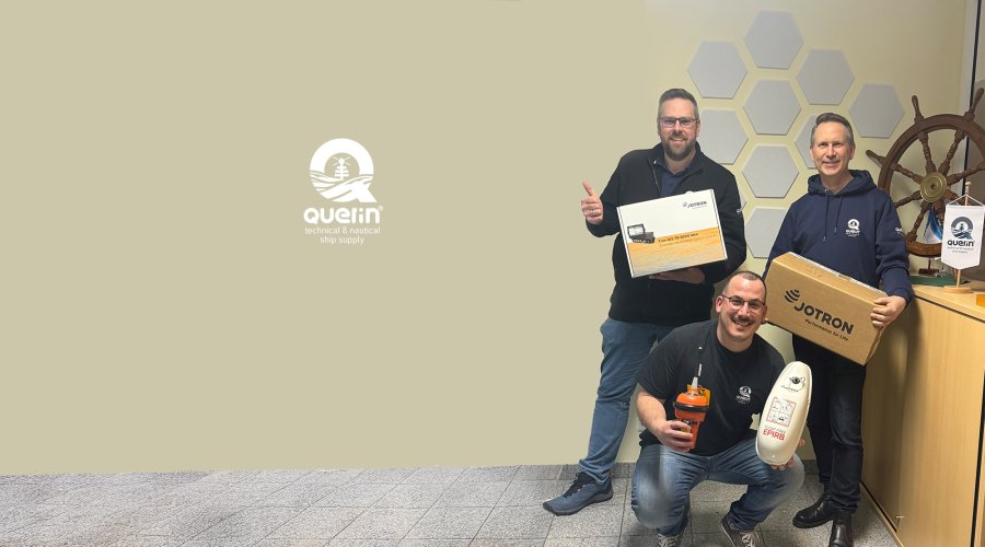Three employees from Querin GmbH holding Jotron products. Three employees from Querin GmbH holding Jotron products.